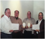 With friends, receiving his award in recognition of  writing the book titled “My thousand and One Screw-ups and What I have learned from them – experiences in International Marketing.” 